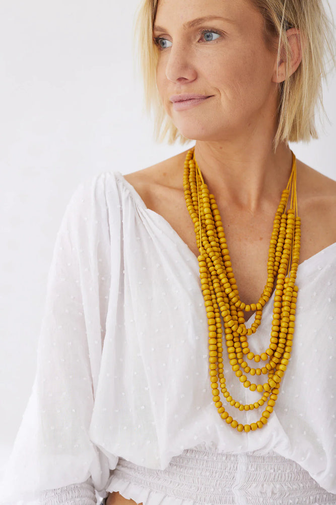 
            
                Load image into Gallery viewer, Timber Bead Necklace- Waimea Mustard
            
        